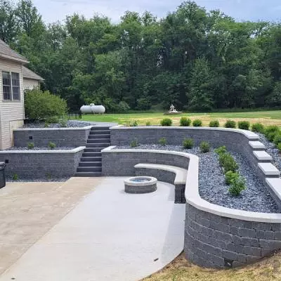 Brick retaining wall with patio