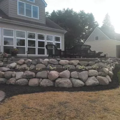 natural stone retaining wall for flower beds