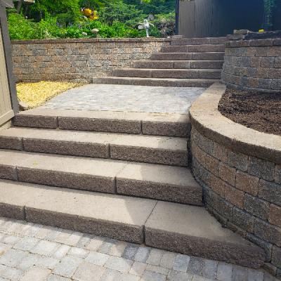 Brick paver retaining wall, walkway, and steps